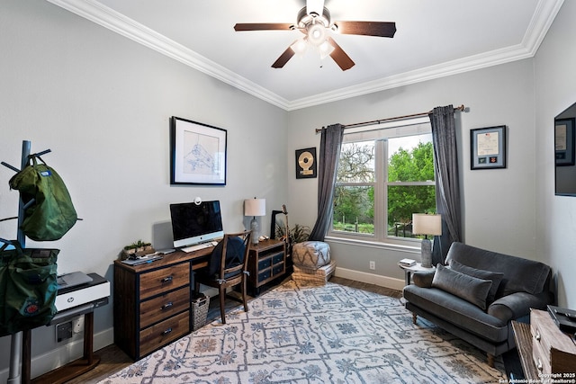 office area with wood finished floors, crown molding, a ceiling fan, and baseboards