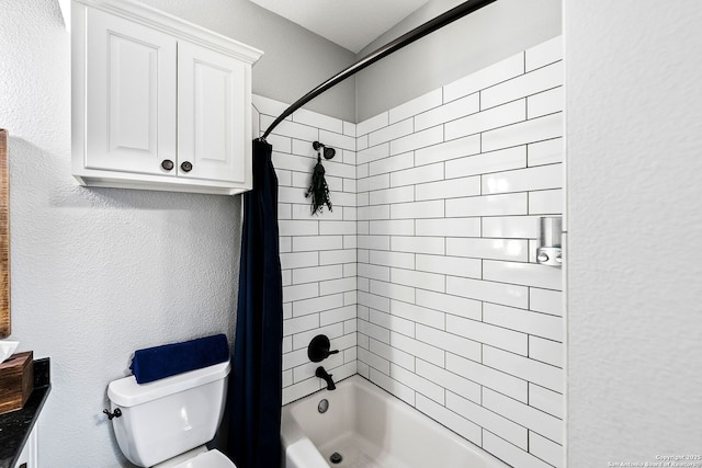 full bathroom with shower / bathtub combination with curtain, toilet, and a textured wall