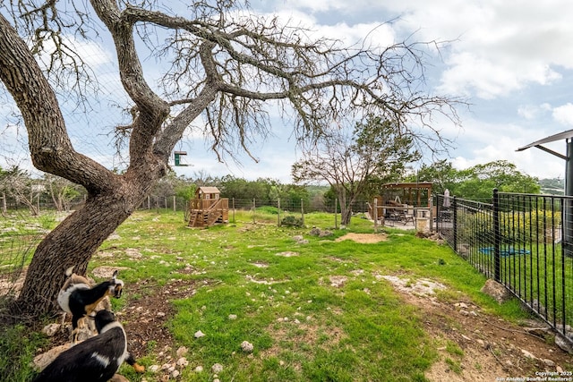 view of yard featuring fence