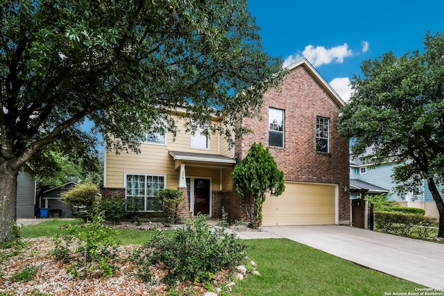 traditional-style house with concrete driveway, an attached garage, and brick siding