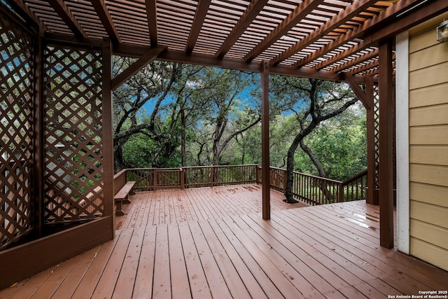 wooden deck featuring a pergola