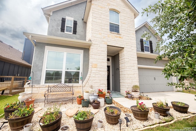 8701 Stackstone, Schertz, TX 78154 - traditional home with stucco siding, stone siding, concrete driveway, an attached garage, and fence