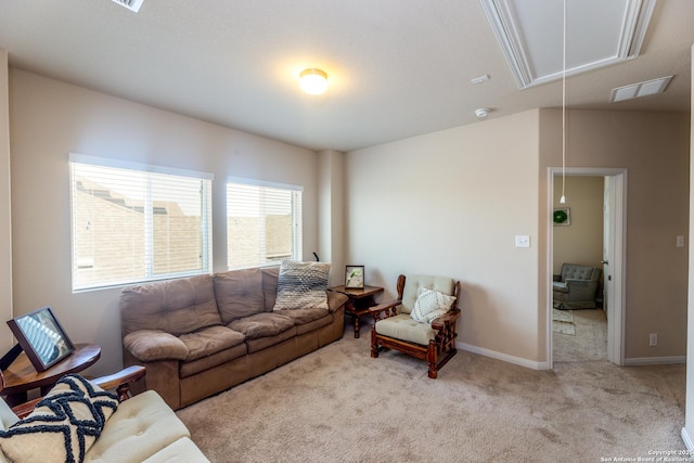8701 Stackstone, Schertz, TX 78154 - living room featuring baseboards, visible vents, attic access, and carpet flooring