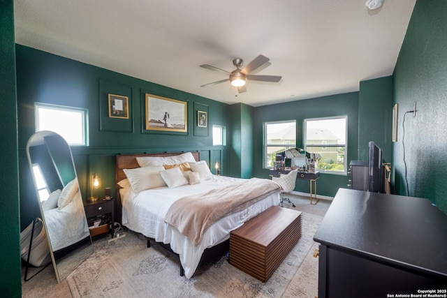 8701 Stackstone, Schertz, TX 78154 - bedroom with light colored carpet, a ceiling fan, and multiple windows