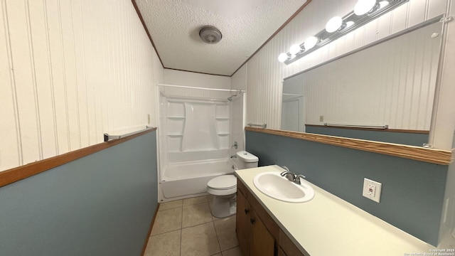17 Fm 473, Comfort, TX 78013 - full bathroom with a textured ceiling, toilet, tile patterned floors, vanity, and  shower combination