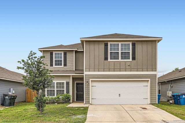 traditional-style house featuring driveway, a front lawn, board and batten siding, and an attached garage