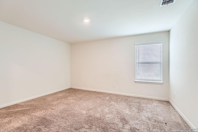 11846 Latour Vly, San Antonio, TX 78252 - carpeted spare room featuring baseboards, visible vents, and recessed lighting