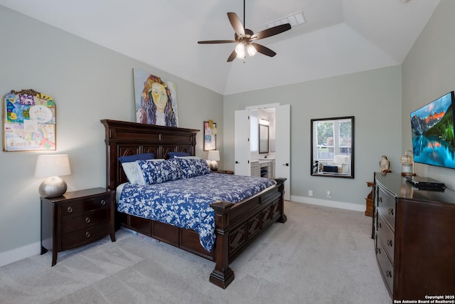 bedroom with a ceiling fan, visible vents, vaulted ceiling, baseboards, and light colored carpet