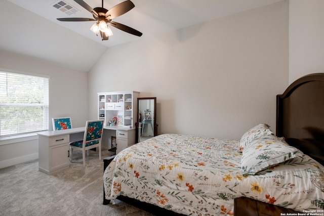 bedroom with a ceiling fan, visible vents, vaulted ceiling, light carpet, and baseboards
