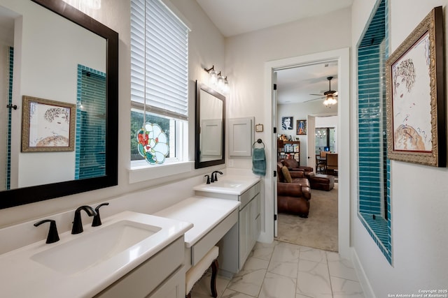 full bathroom featuring marble finish floor, a sink, double vanity, and ensuite bath