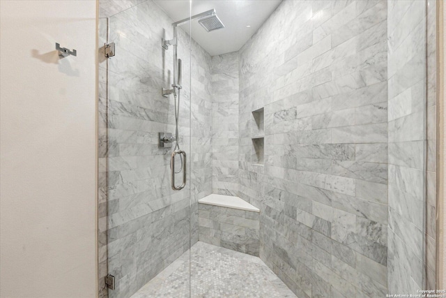 bathroom with a stall shower