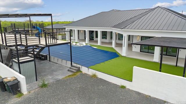 view of pool with a patio