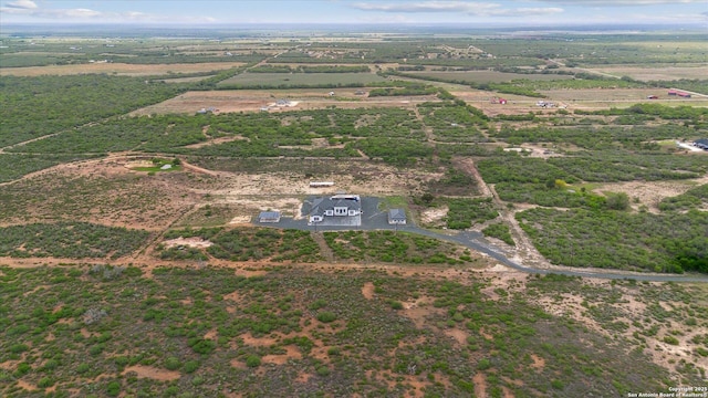 birds eye view of property featuring a rural view