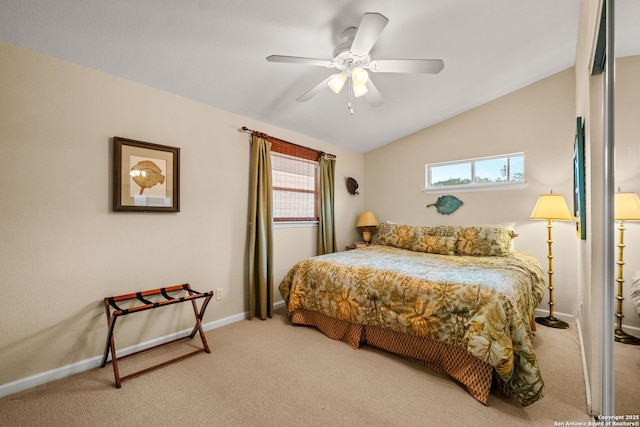 bedroom with carpet, baseboards, vaulted ceiling, and multiple windows