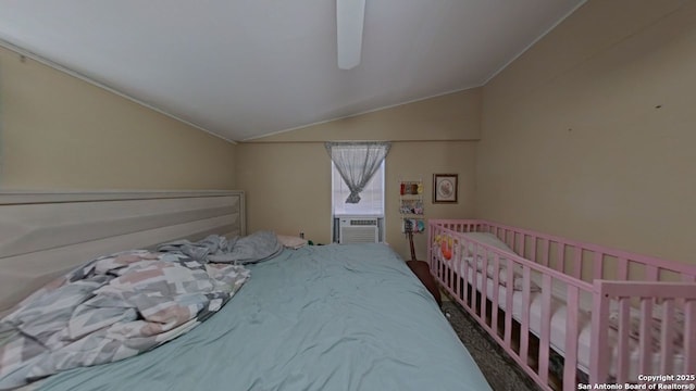 carpeted bedroom featuring cooling unit, ceiling fan, and vaulted ceiling