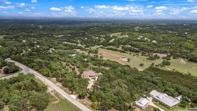 bird's eye view featuring a forest view