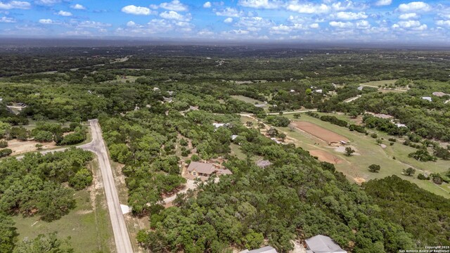 bird's eye view with a view of trees