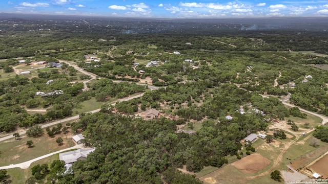 bird's eye view featuring a forest view