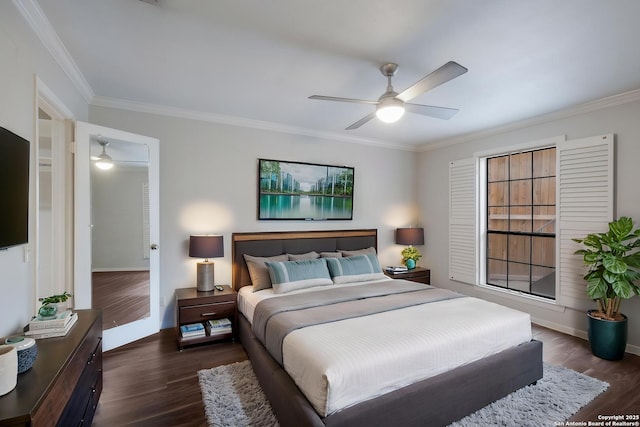 bedroom featuring baseboards, ornamental molding, and dark wood-type flooring