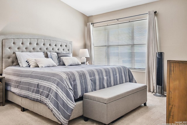 bedroom with light carpet