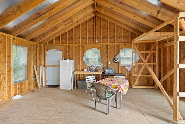 interior space featuring vaulted ceiling