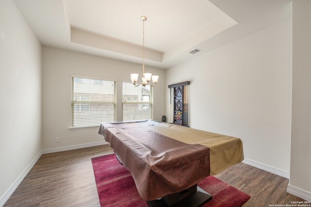 recreation room with wood finished floors, pool table, baseboards, visible vents, and a raised ceiling