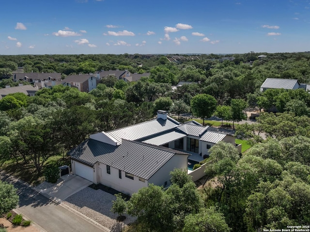 bird's eye view with a view of trees