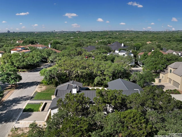 bird's eye view with a residential view and a forest view