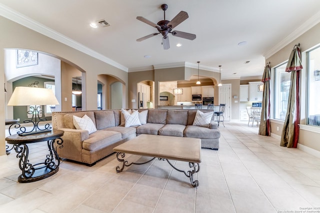 831 Fawnway, San Antonio, TX 78260 - living room featuring light tile patterned floors, visible vents, ceiling fan, and a healthy amount of sunlight