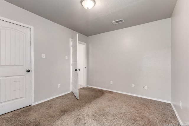 507 Lovera, San Antonio, TX 78212 - unfurnished bedroom with visible vents, baseboards, and carpet floors
