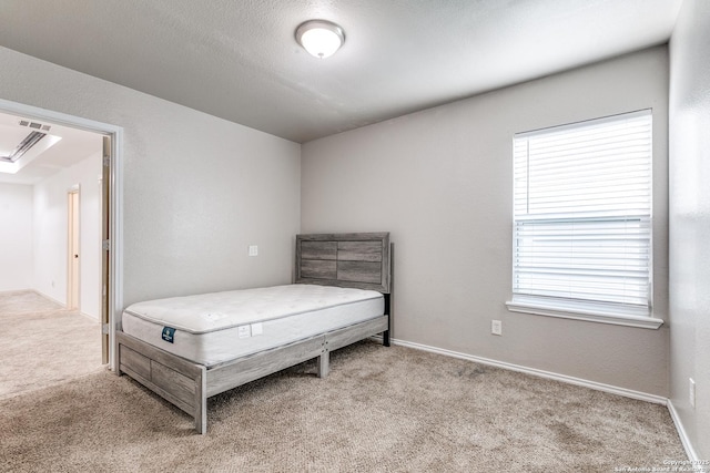 507 Lovera, San Antonio, TX 78212 - bedroom featuring carpet flooring, multiple windows, and visible vents