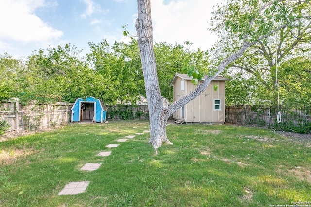 507 Lovera, San Antonio, TX 78212 - view of yard featuring a storage shed, an outbuilding, and a fenced backyard