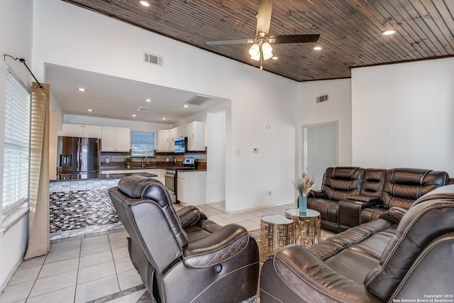 507 Lovera, San Antonio, TX 78212 - living room featuring light tile patterned floors, visible vents, and a wealth of natural light