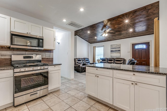 507 Lovera, San Antonio, TX 78212 - kitchen featuring stainless steel appliances, light tile patterned floors, visible vents, white cabinetry, and open floor plan