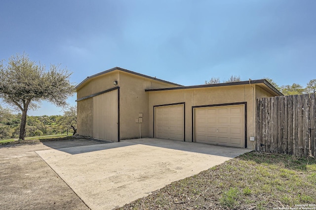 detached garage with fence