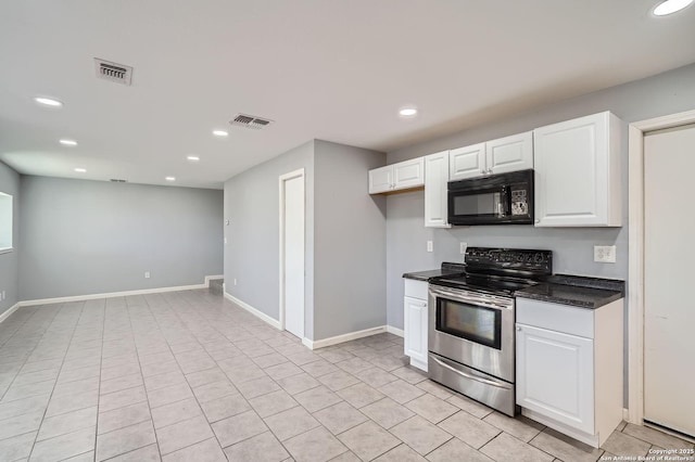 kitchen with black microwave, dark countertops, stainless steel range with electric cooktop, and recessed lighting