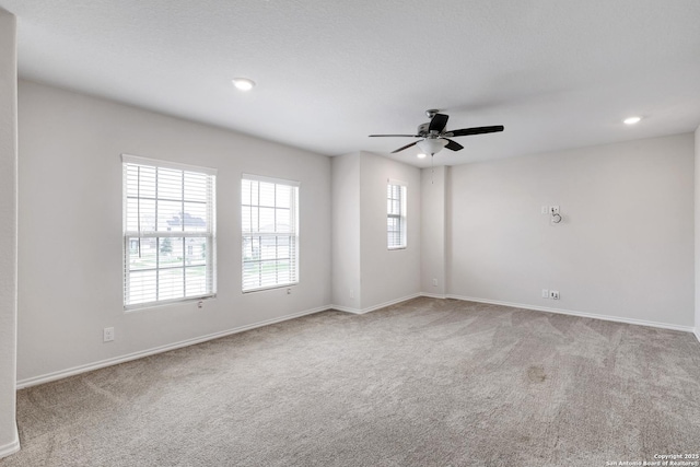 9416 Tennant Ln, Converse, TX 78109 - spare room with recessed lighting, ceiling fan, carpet, and baseboards