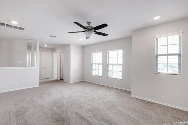 9416 Tennant Ln, Converse, TX 78109 - spare room with visible vents, baseboards, recessed lighting, carpet, and a ceiling fan