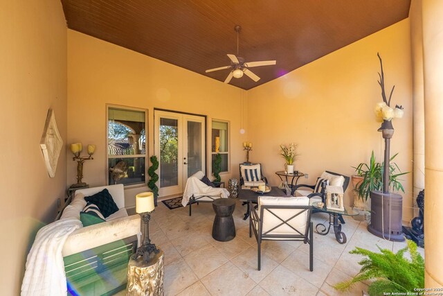 view of patio / terrace featuring outdoor lounge area, a ceiling fan, and french doors