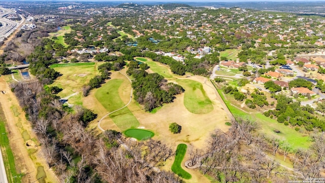 drone / aerial view with a residential view and view of golf course
