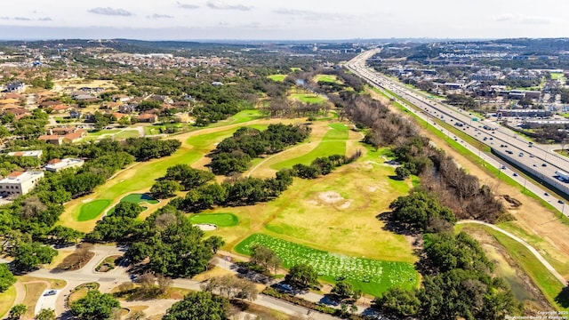 birds eye view of property with golf course view