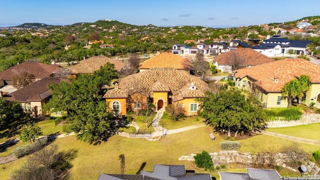 aerial view with a mountain view and a residential view