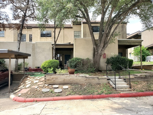 view of front of property featuring stucco siding