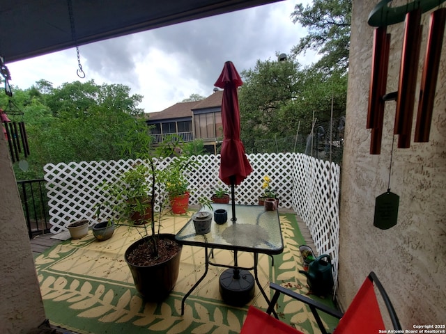 view of patio / terrace with fence