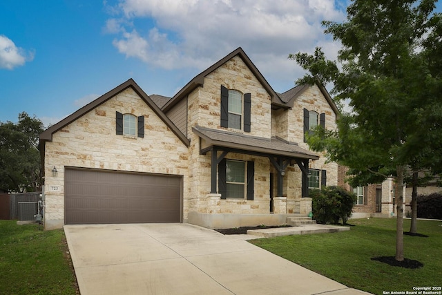 723 Decathlon, San Antonio, TX 78245 - view of front of property with driveway, a porch, a front lawn, and stone siding