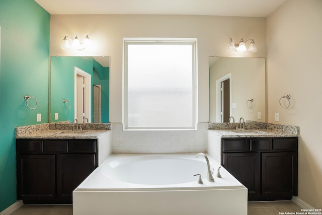 723 Decathlon, San Antonio, TX 78245 - bathroom featuring two vanities, a bath, and a sink