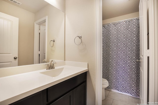 723 Decathlon, San Antonio, TX 78245 - bathroom with vanity, toilet, visible vents, tile patterned flooring, and a shower with shower curtain