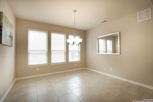 723 Decathlon, San Antonio, TX 78245 - unfurnished room with baseboards, visible vents, a notable chandelier, and tile patterned flooring