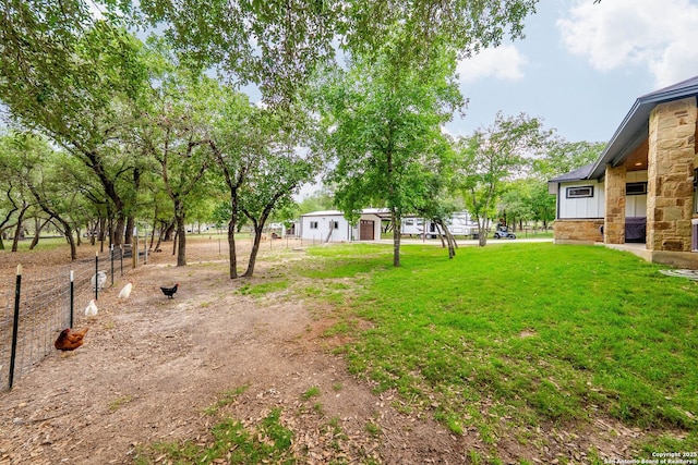 view of yard featuring fence