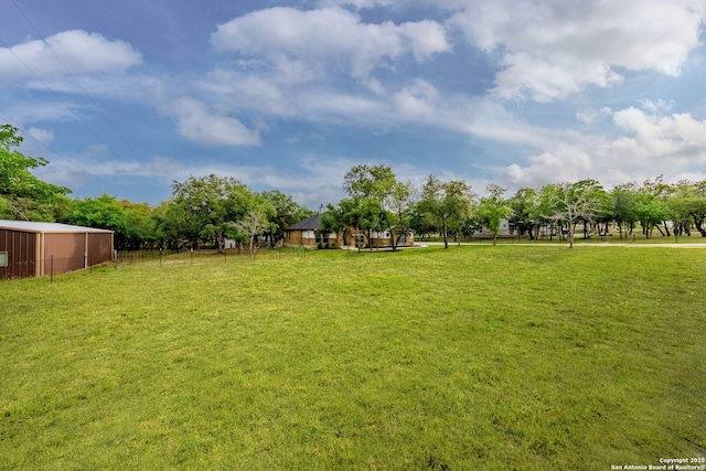 view of yard featuring fence